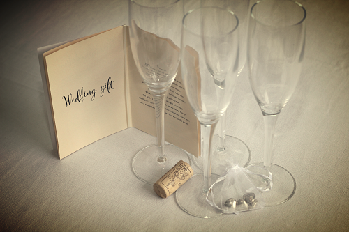 Wine glasses, cork and invite
